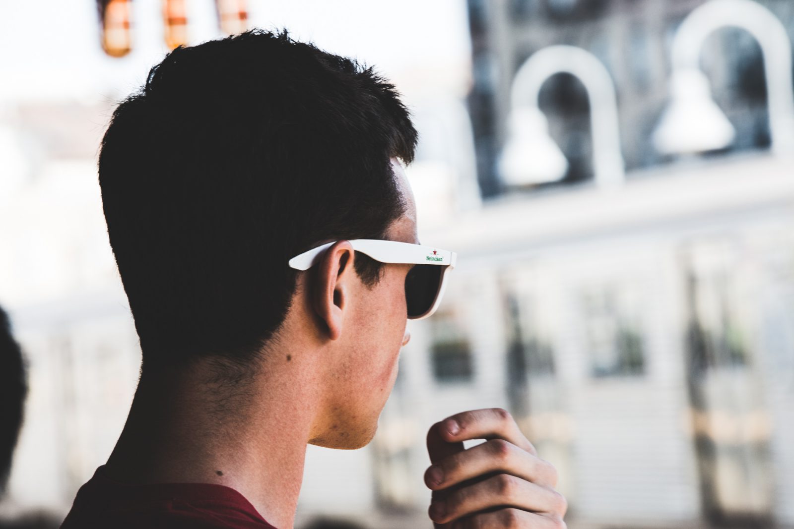 man looking at train