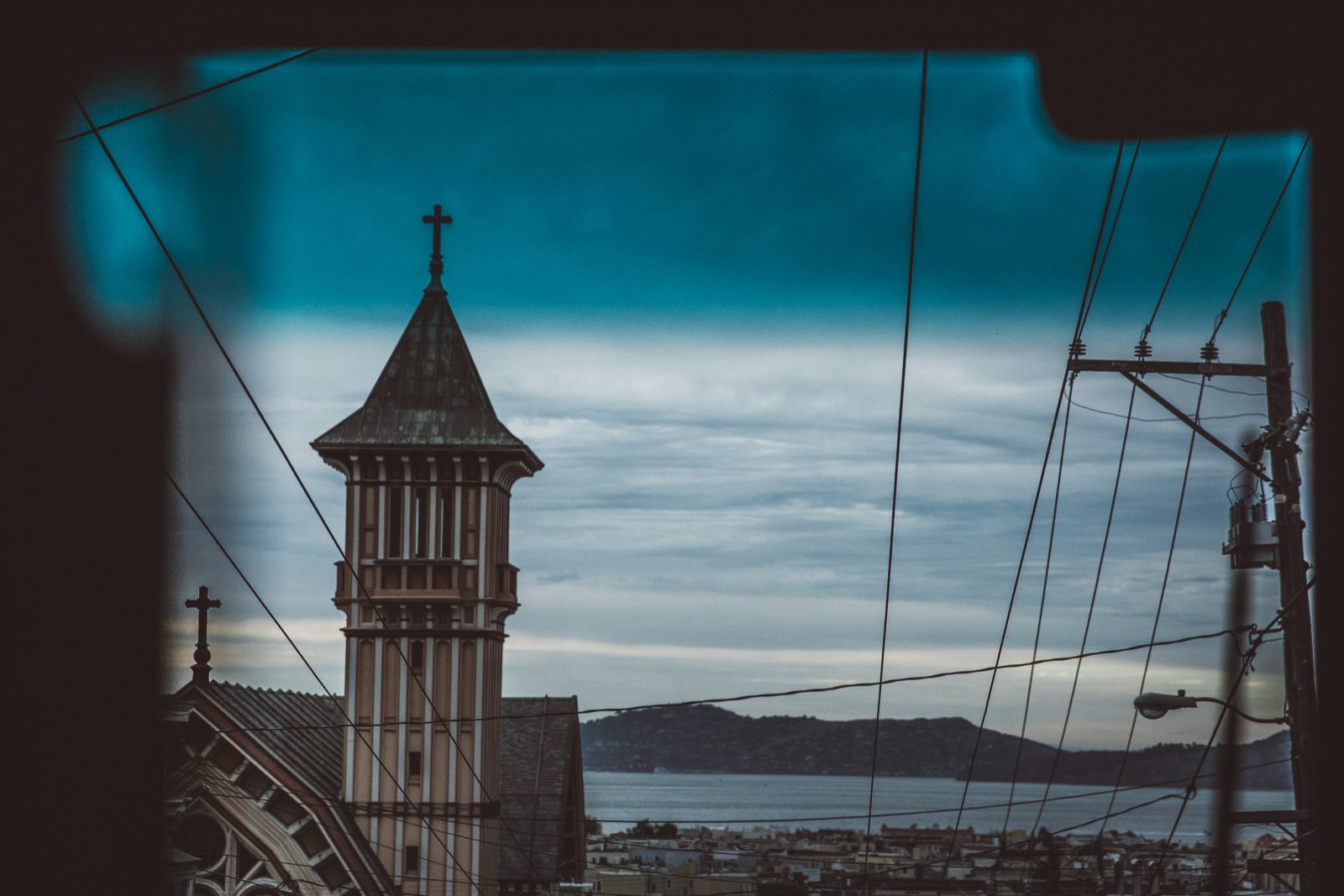 church with steeple overlooking the bay