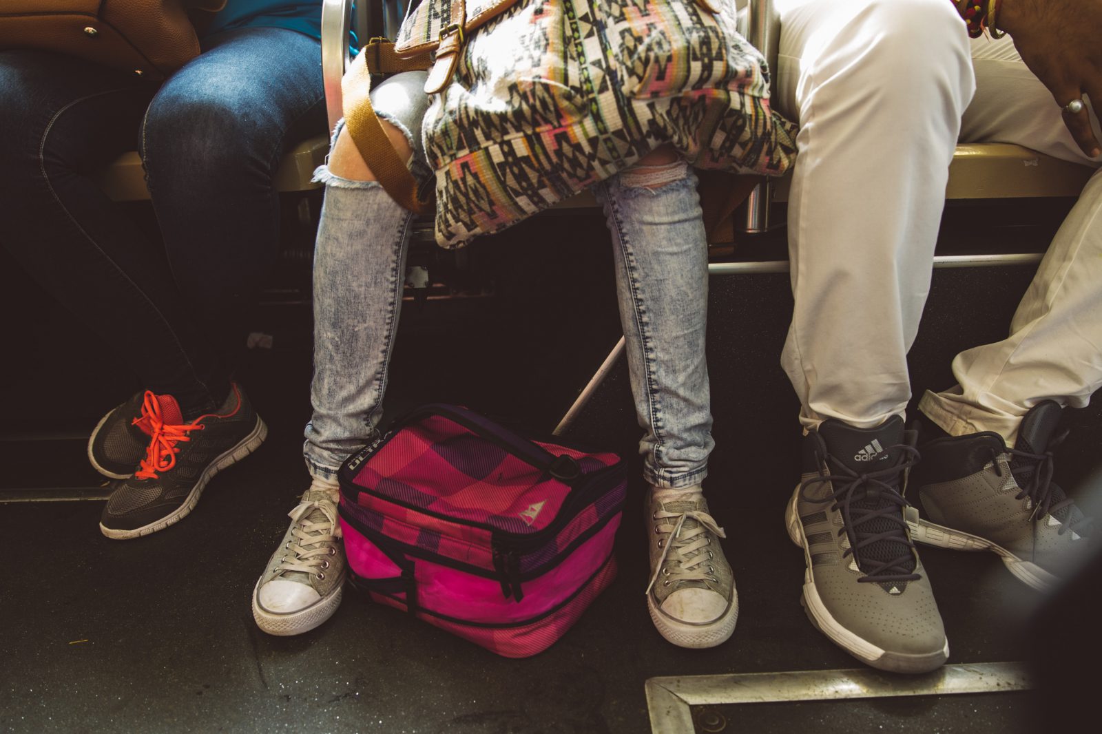 sitting on the bus with bag